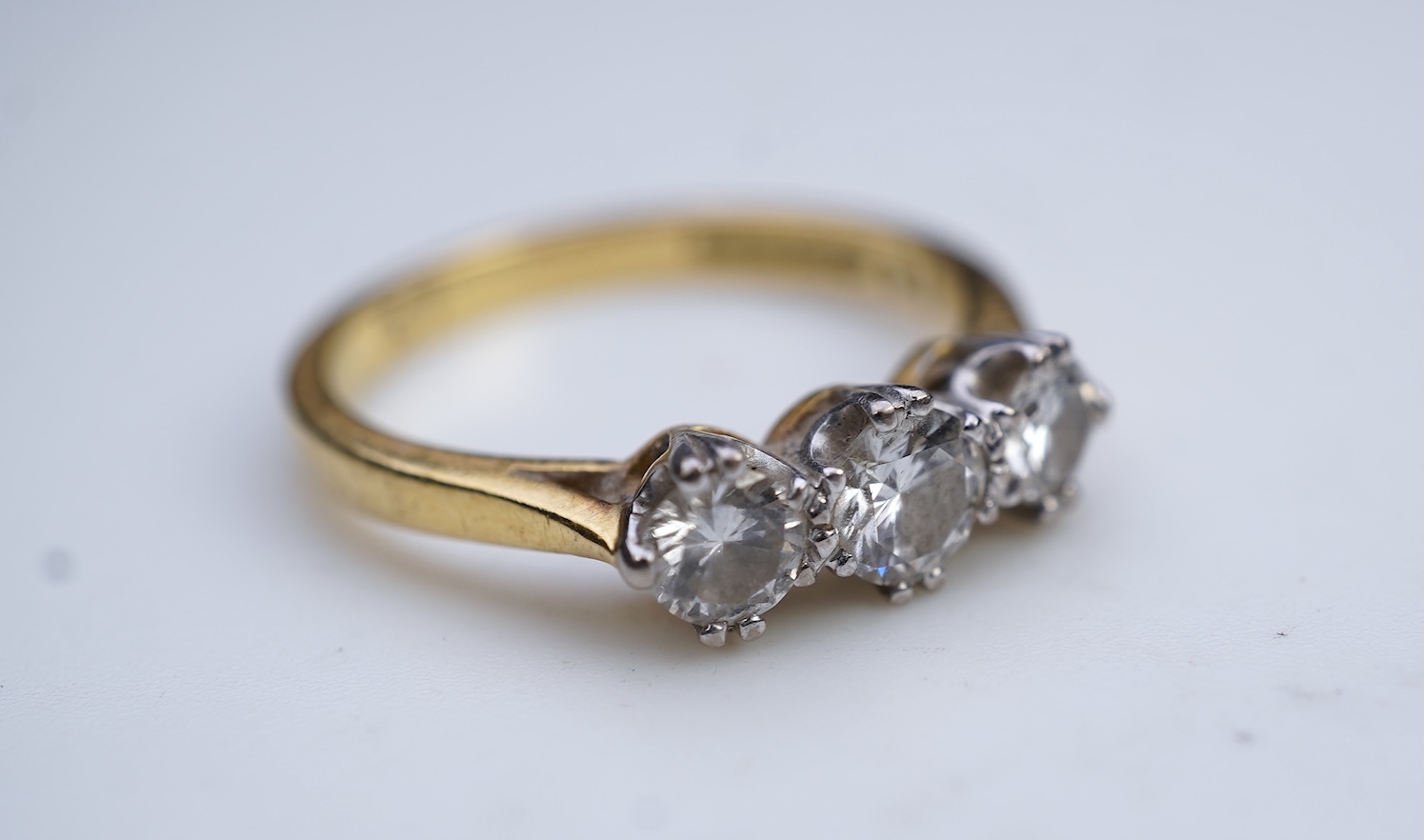 A three-stone diamond ring
